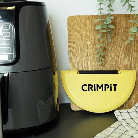 CRIMPiT Tortilla Sealer placed next to an air fryer