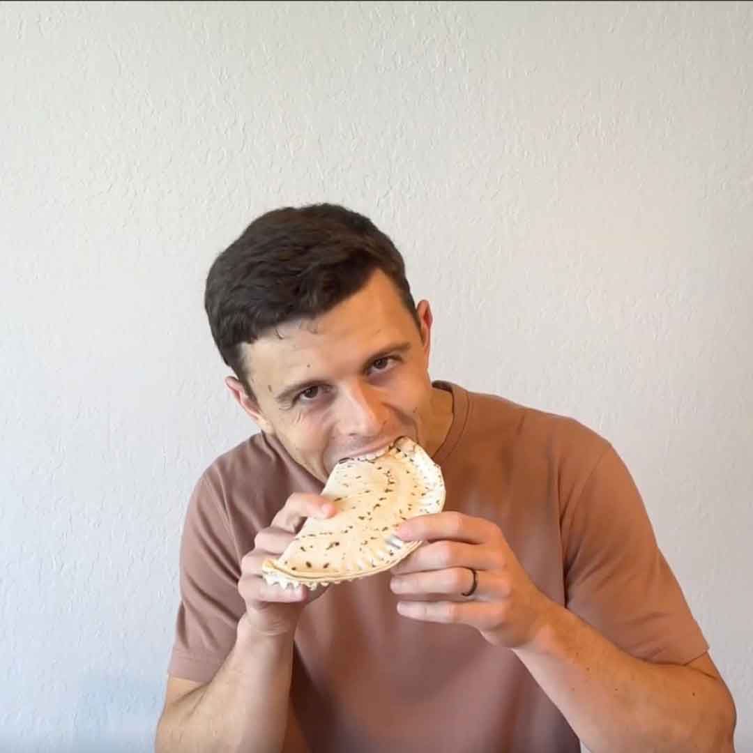 man-biting-into-sealed-crimpit.jpg__PID:e1634962-b09a-49ef-a148-ae9b0fb41873